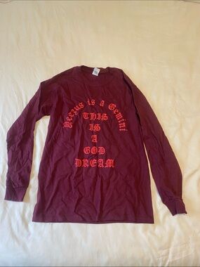 Maroon Kanye West Graphic Long Sleeve Tee with Red Gothic Text.